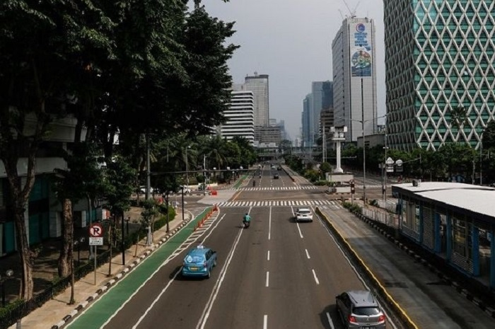 Ilustrasi PPKM. Pemerintah resmi cabut PPKM mulai 30 Desember 2022. Bikers bisa kopdar lagi nih!