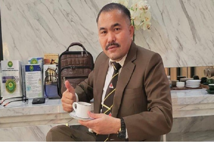 Kamaruddin Simanjuntak. 