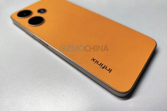 Tampilan hp terbaru Infinix, yakni Infinix Hot 30i varian Marigold (orange) yang akan meluncur tanggal 27 Maret 2023.