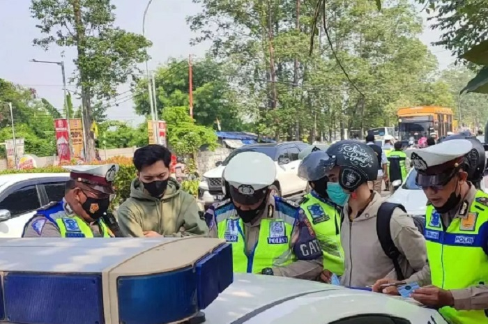 Ilustrasi, tilang manual kembali digelar Ditlantas Polda Bengkulu dan sudah berjalan sejak 1 Februari 2023 lalu.