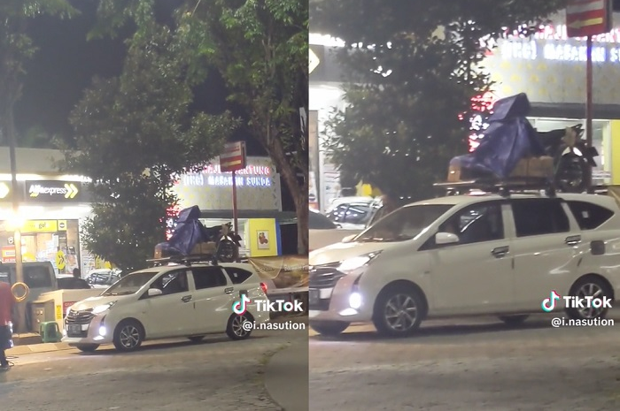 Mobil LCGC putih mudik sambil bawa motor di atap.