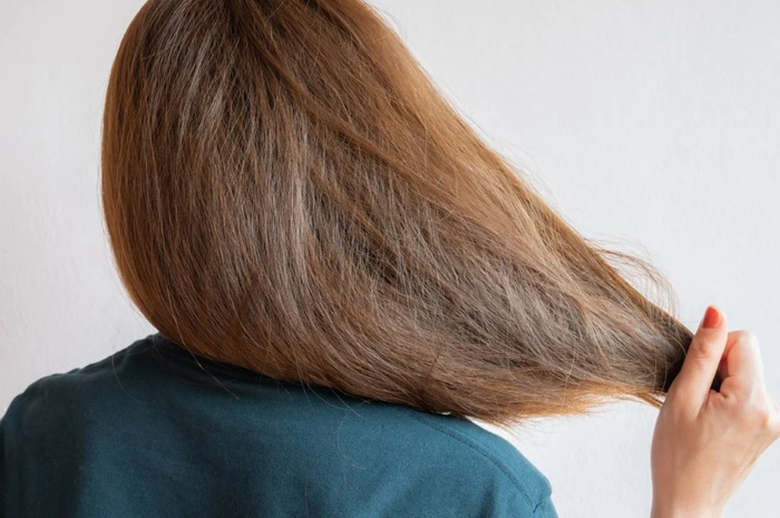 Ilustrasi rambut mengembang dan susah diatur