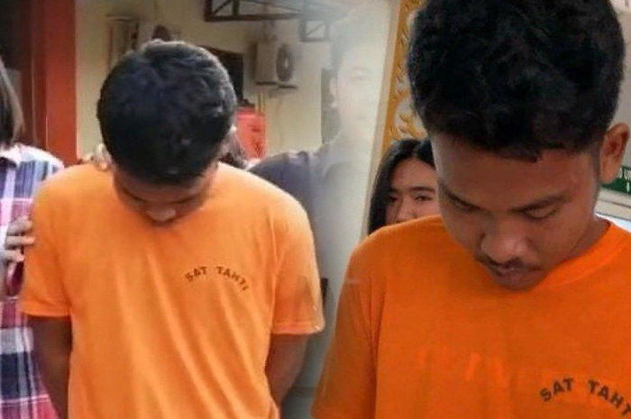 Robihari Agus, anak pemilik kos yang perkosa mahasiswi, tertunduk ketika digiring oleh personel Satreskrim Polrestabes Medan, menuju ke sel tahanan, Jumat (20/10/2023). 