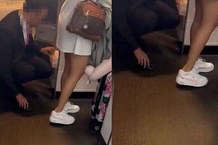 Seorang pramugara mengintip wanita menggunakan kamera ponselnya.