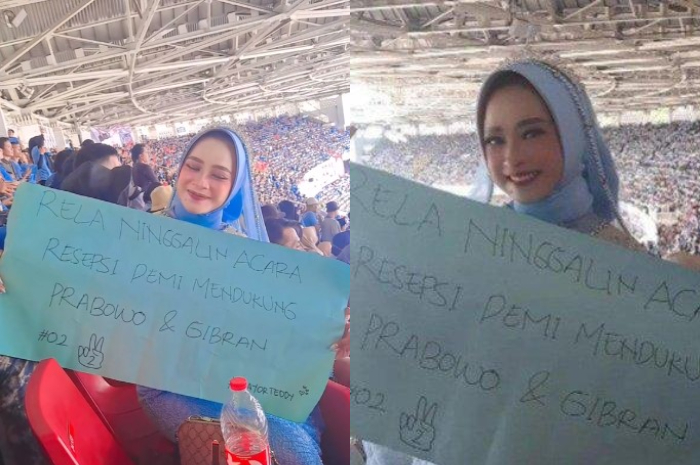Seorang pengantin wanita mengenakan baju pengantin saat kampanye akbar Prabowo - Gibran di GBK.