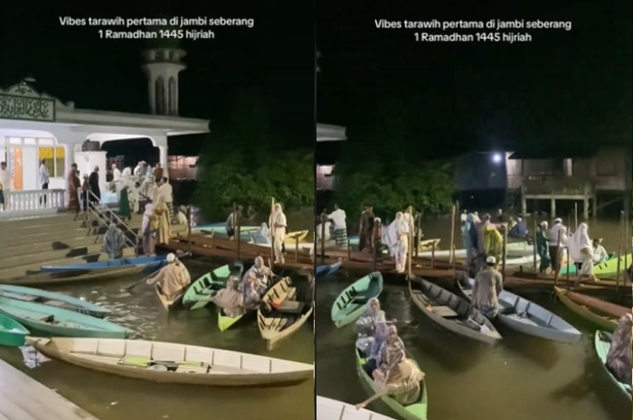 Momen warga di Jambi pulang salat tarawih naik perahu.