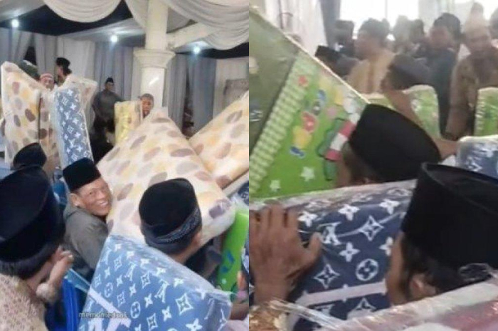 tamu undangan semringah dapat souvenir kasur lipat