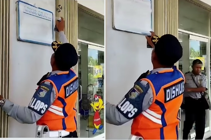 Oknum Dishub terlihat menghapus plang parkir di minimarket