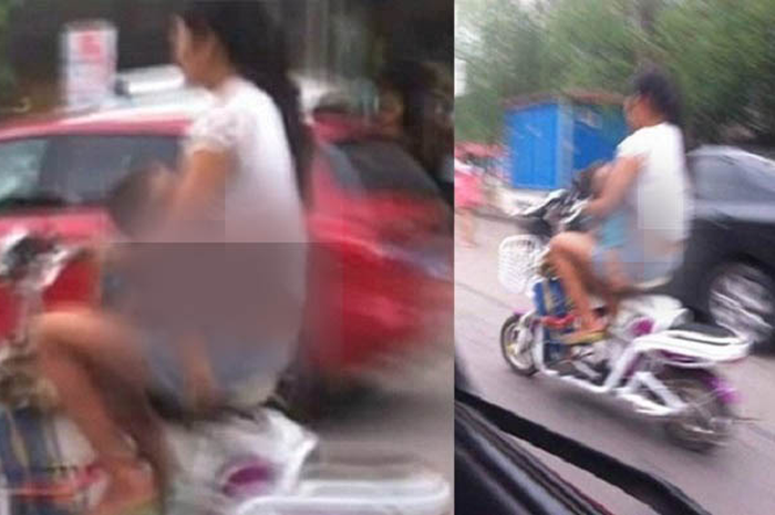 Wanita ini nekat susui bayinya saat naik motor