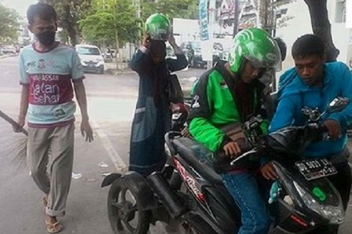 Salah satu driver ojol difabel, mereka membutuhkan kesejahteraan yang layak.
