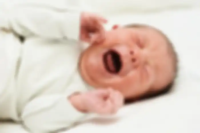 Ilustrasi bayi menangis.