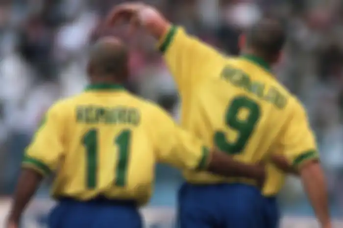 Brazil's goal scorers Romario (left) and Ronaldo (right) celebrate taking their team into the final of the FIFA Confederations Cup