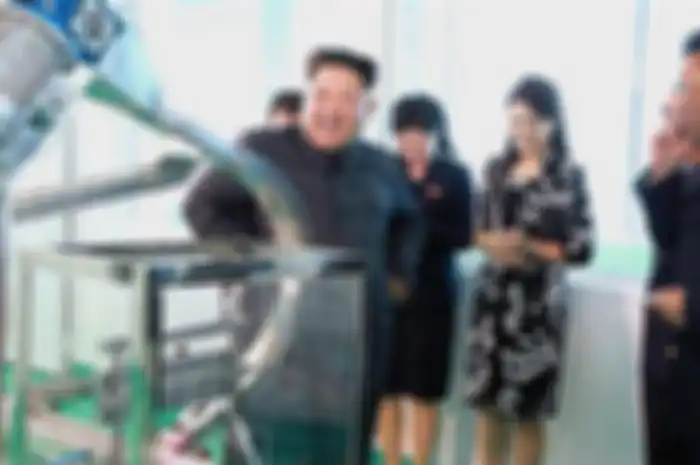 Kim Jong Un dan Ri Sol Ju 