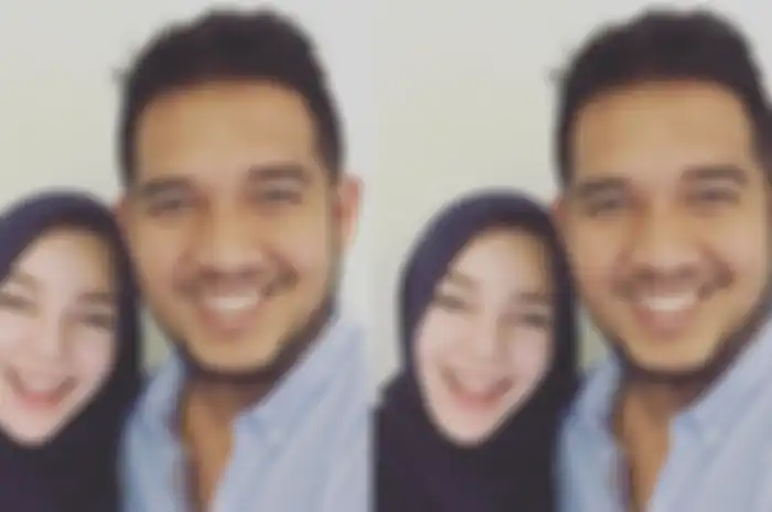Dewi Sandra dan suami