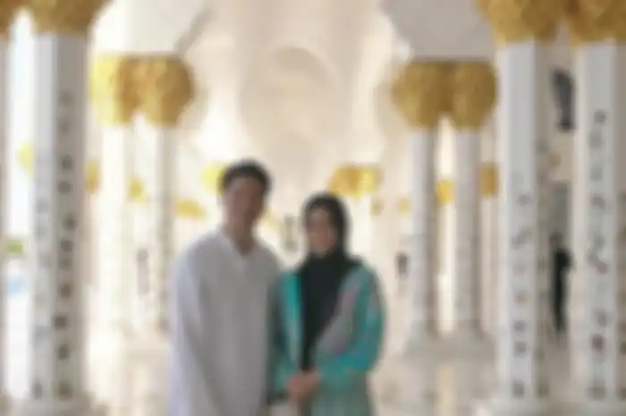 Rini Yulianti dan Suami