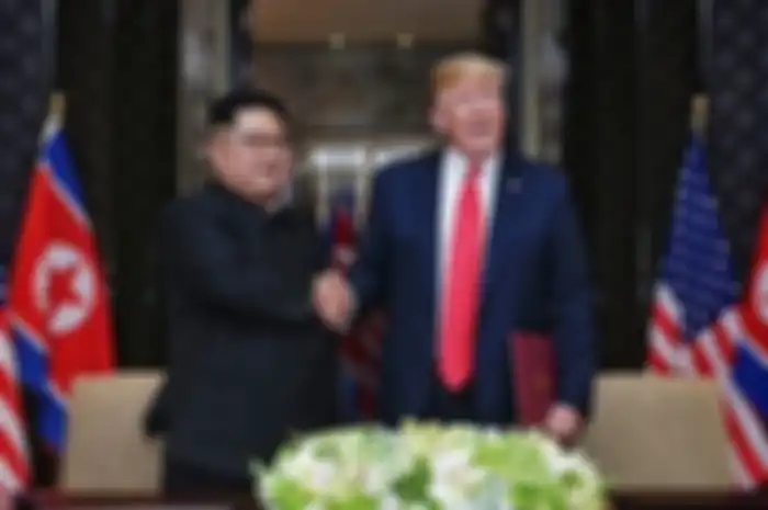 Kim Jong Un dan Donald Trump di Singapura