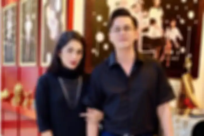 Ussy Sulistiawaty dan Andhika Pratama