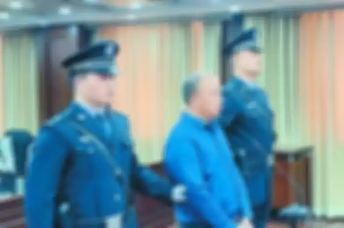 Guo saat berada di pengadilan 