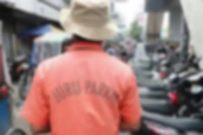 Ilustrasi tukang parkir.