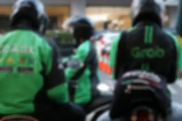 Ilustrasi Gojek dan Grab