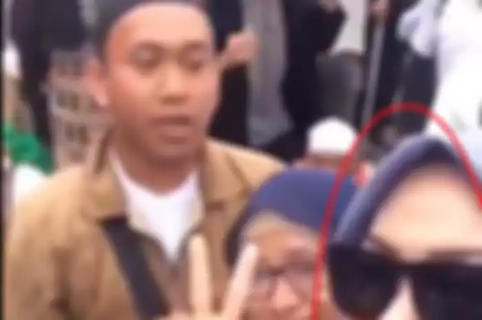 HS dan sosok wanita yang jadi buron polisi.