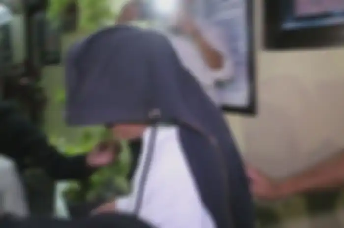 Kasus IAS pria yang membuat dan menyebar video adu domba TNI-Polri dilimpahkan ke Polda Jabar.(Foto: Kompas.com, Muhammad Syahri Romdhon)