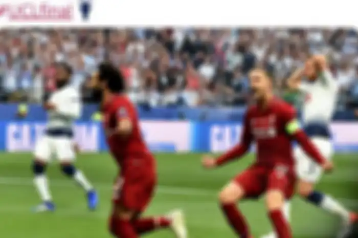 Penyerang Liverpool, Mohamed Salah, merayakan gol ke gawang Tottenham Hotspur dalam laga final Liga Champions di Stadion Wanda Metropolitano, Sabtu (1/6/2019).