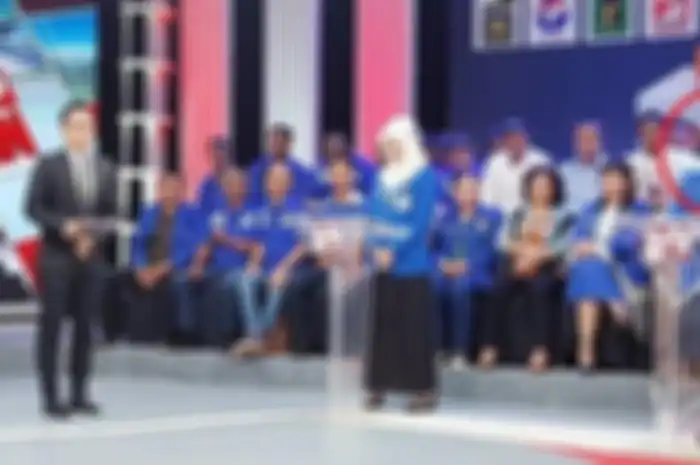 Joy Tobing saat debat dengan Desi Ratnasari