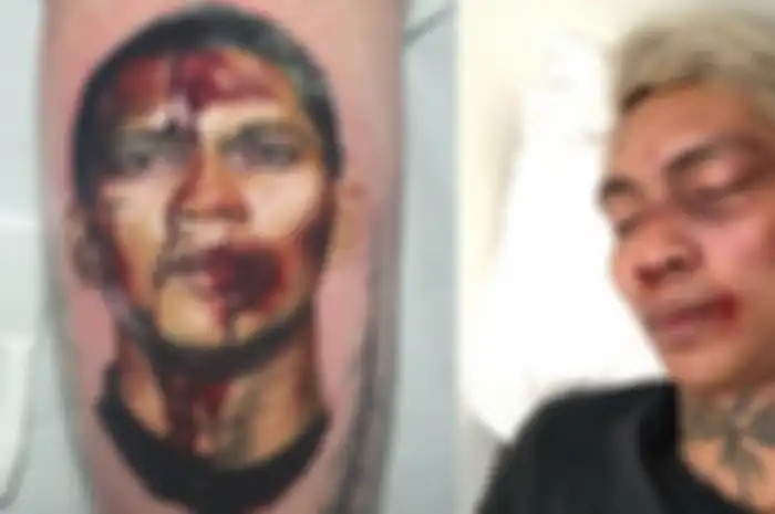 Tato wajah Iko Uwais yang disebut netizen Indonesia mirip Young Lex