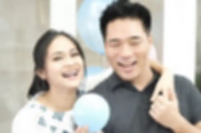 Rini Yulianti dan suami, Michael Andrew Ha 