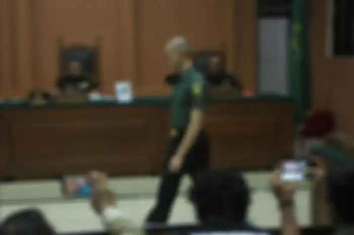 Prada DP saat jalani sidang perdana kasus pembunuhan mutilasi Fera Oktaria (Kamis 1 Agustus 2019)