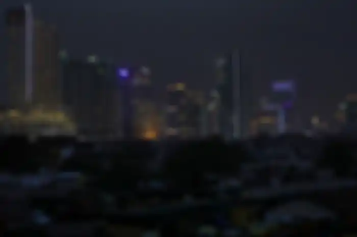 Suasana kota Jakarta yang terdampak listrik padam di Tanah Abang, Jakarta Pusat, Minggu (4/8/2019). Aliran listrik di Banten, Jabodetabek hingga Bandung terputus akibat adanya gangguan pada sejumlah pembangkit di Jawa. TRIBUNNEWS/IRWAN RISMAWAN
