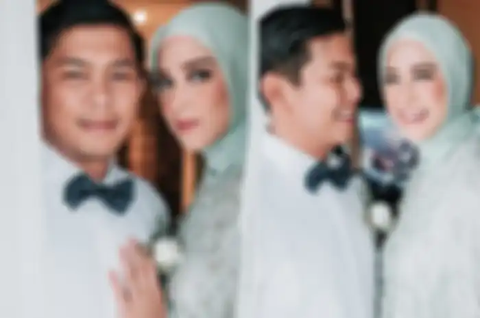 Nina Zatulini dan suami