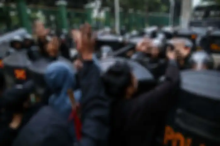 Pelajar melakukan Aksi Tolak RUKHP di Belakang Gedung DPR/MPR, Palmerah, Jakarta Barat, Rabu (25/9/2019). 