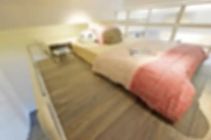 Desain Kompak Kamar Tidur Berlantai Mezanin yang Berhasil Memecahkan Masalah Lahan Terbatas
