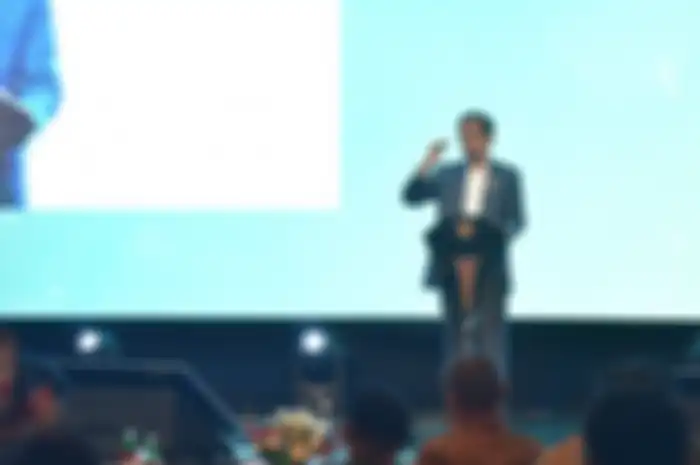 Jokowi saat memberikan sambutan pada acara pembukaan Kompas 100 CEO Forum yang digelar di Grand Ballroom, Hotel Ritz Carlton, Kuningan, Jakarta Pusat, pada Kamis, (28/11/2019).