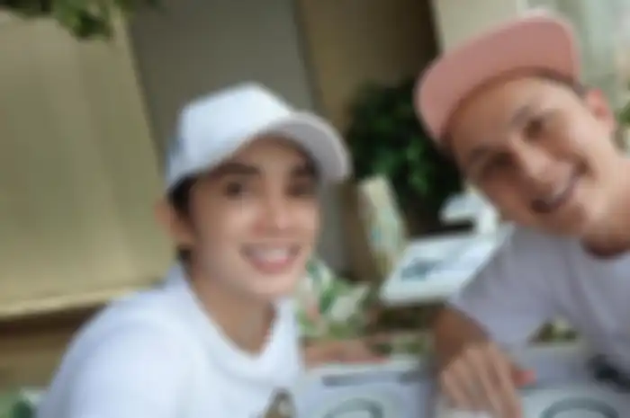 Ussy Sulistiawaty dan Andhika Pratama