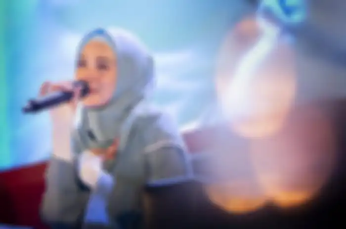 Ekspresi senyum-tangis Mulan Jameela menyambut kebebasan Ahmad Dhani.
