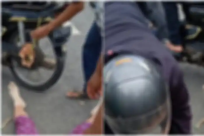 Warga mendokumentasikan tragedi ketika seorang perempuan setengah baya diduga jatuh dari motor akibat roknya melilit gir motor yang ditumpangi. Peristiwa terjadi di Wates, Kulon Progo, Daerah Istimewa Yogyakarta.