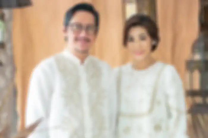 Andre Taulany dan istrinya
