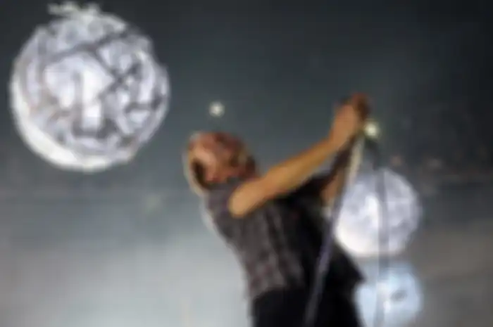 Mandatory Credit: Photo by Mario Ruiz/EPA-EFE/Shutterstock (9458314d) Eddie Vedder, lead singer of American alternative rock band Pearl Jam, performs during a concert at Movistar Arena in Santiago, Chile, 13 March 2018 (issued 14 March 2018). Pearl Jam kicks off its South American tour on 13 March and will feature at Lollapaplooza Chile, Argentina and Brazil. Pearl Jam concert in Chile, Santiago - 13 Mar 2018