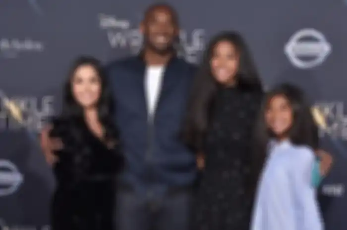 Kobe Bryant dengan istri dan kedua anaknya