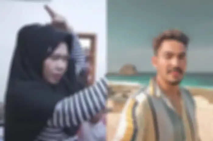 Ningsih Tinampi dan Robby Purba