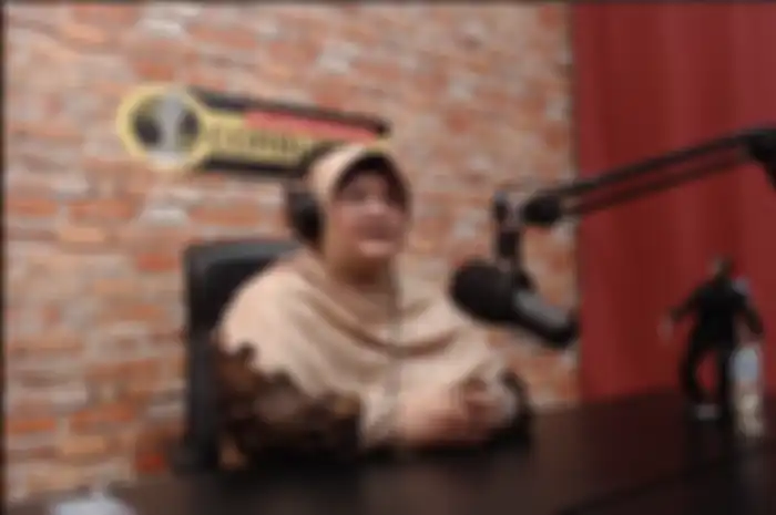 Dr. Erlina Burhan