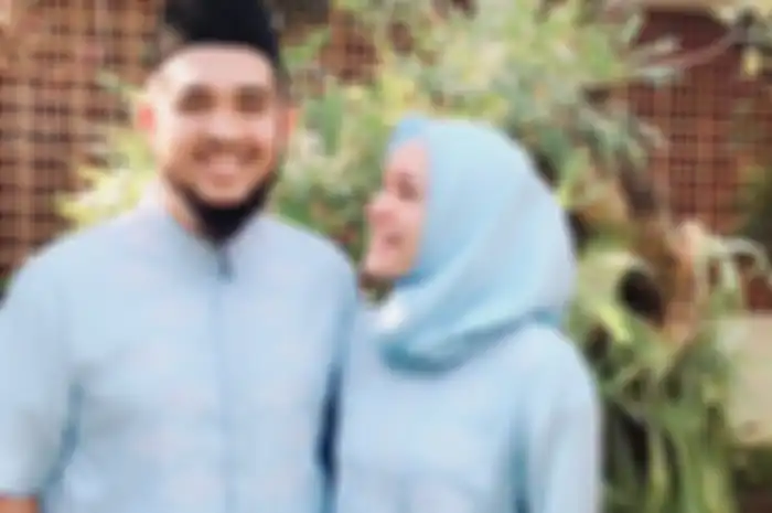Dewi Sandra dan suami