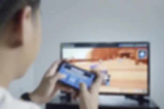 Ilustrasi main gim hape lewat AirConsole