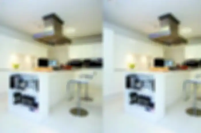 Dapur putih, bersih, dan mewah berkonsep modern minimalis.