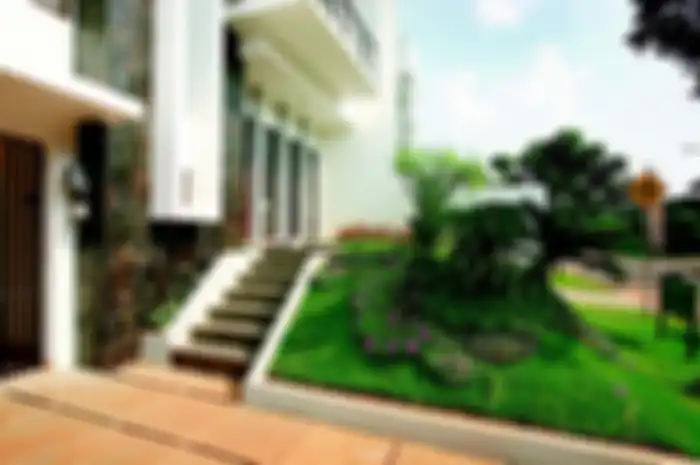 Ilustrasi fasad rumah dengan taman dan dinding cantik berlapis batu alam. 
