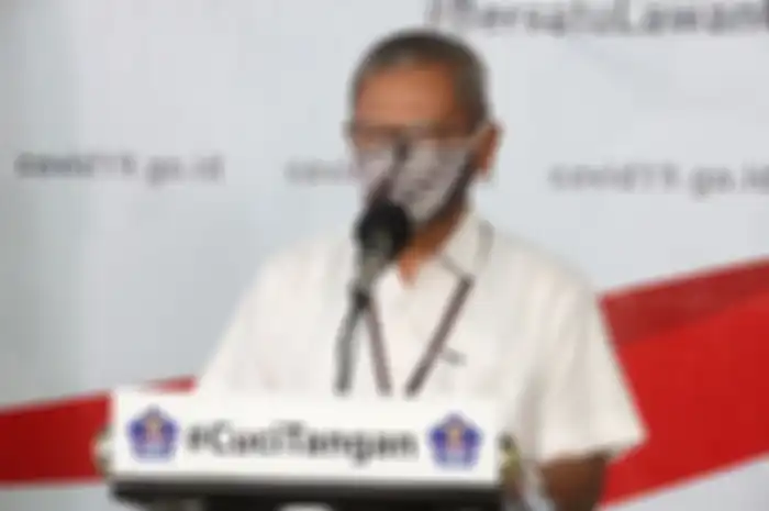 Juru bicara pemerintah untuk penanganan virus corona Achmad Yurianto dalam konferensi pers di Graha BNPB pada Kamis (9/4/2020).