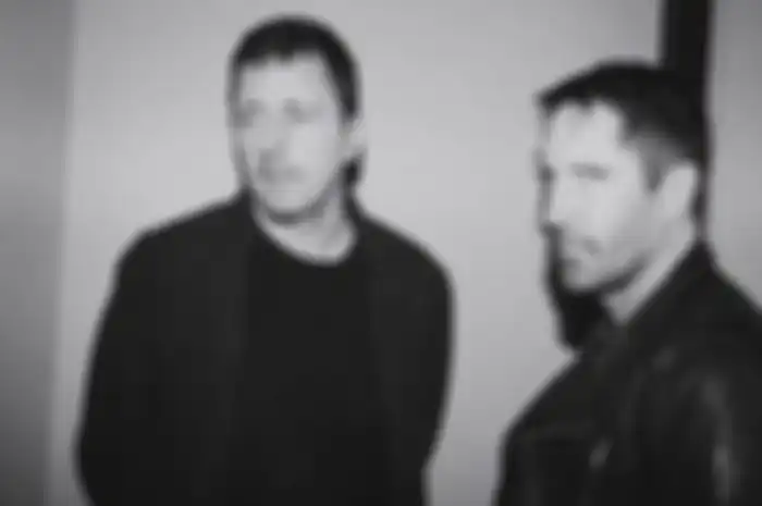 Atticus Ross (kiri) dan Trent Reznor (kanan)